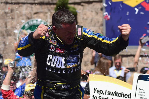 Tony Stewart celebrates his most recent NASCAR Sprint Cup win at Sonoma.