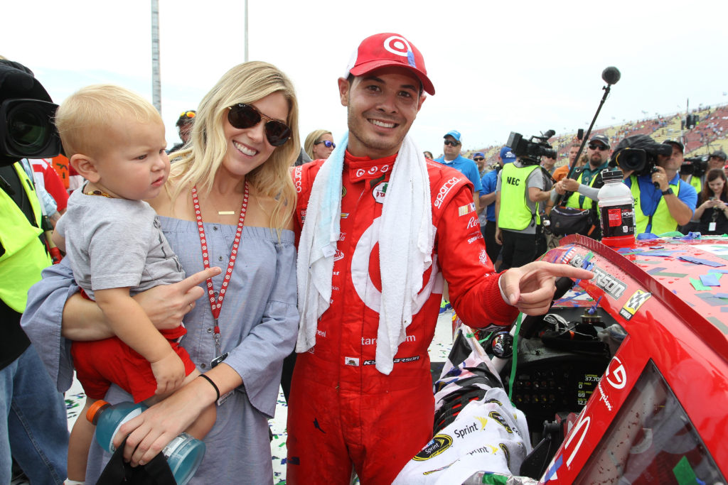 Kyle Larson celebrates his emotional first Cup win with girlfriend Katelyn Sweet and son Owen.