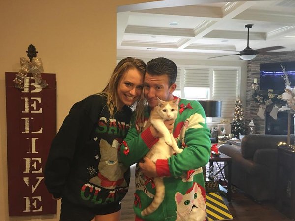 AJ and his girlfriend Tara celebrating last Christmas with their newest family member - Mr. Tickles! (Photo Credit: AJ Allmendinger via Twitter)