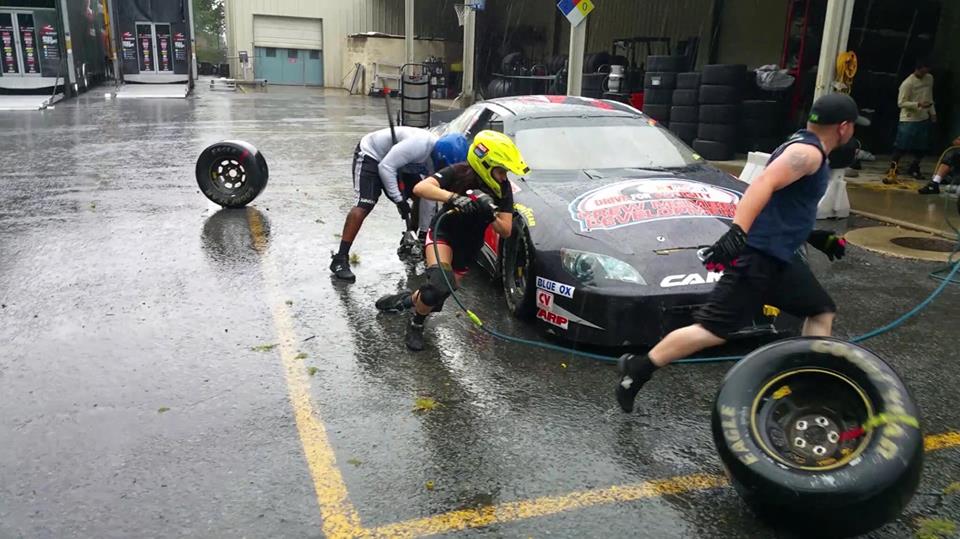 Rain or shine, a pit crew prospect always works hard.