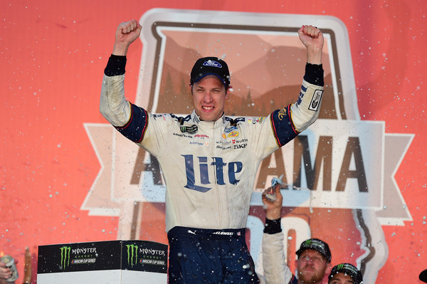 Brad Keselowski with his victorious pose, the same stance used when he beat Mike Tyson's Punchout on the NES.