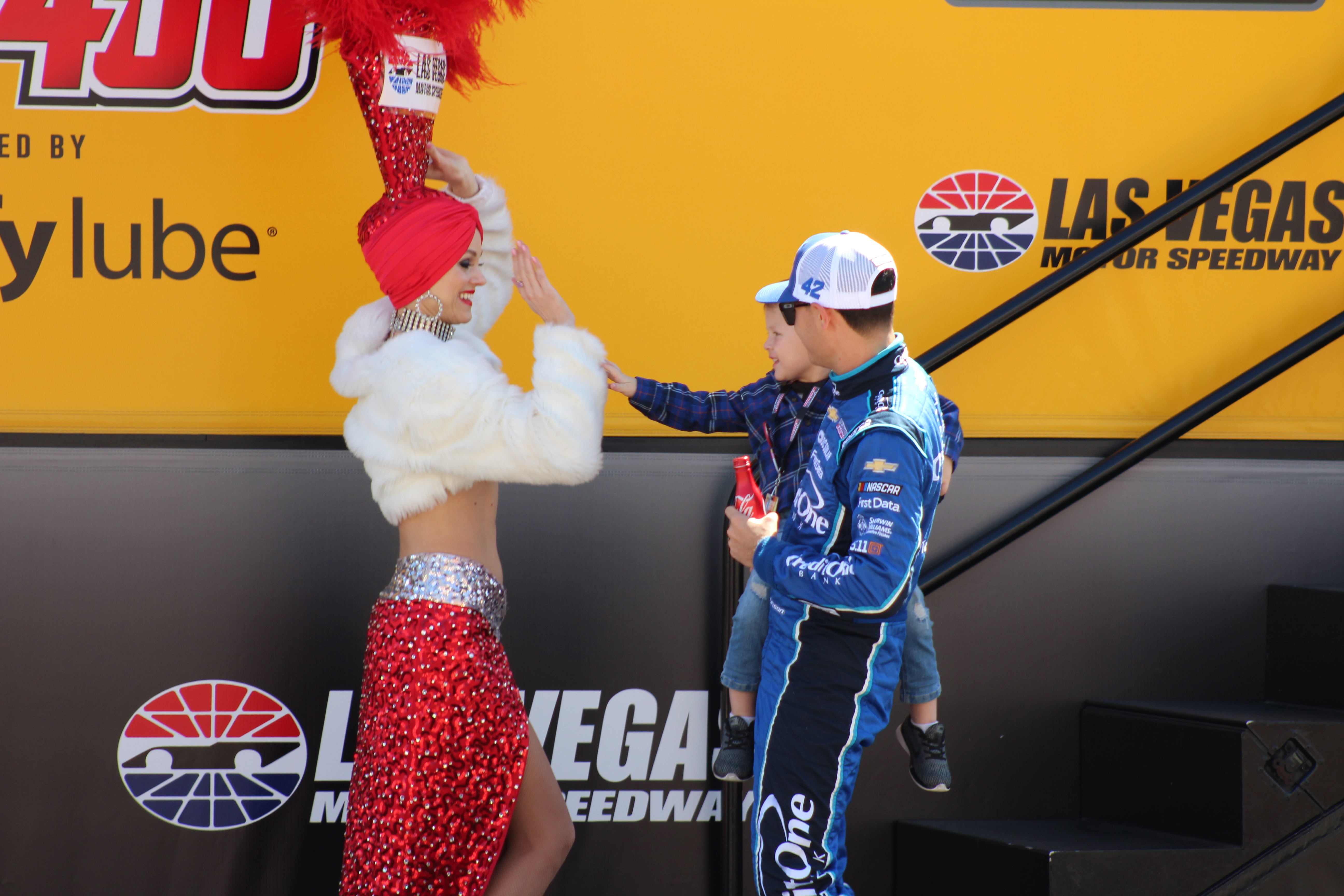 Kyle and Owen Larson get a lucky Las Vegas high five prior to the Pennzoil 400. (Photo Credit: Jose L. Acero Jr/TPF)