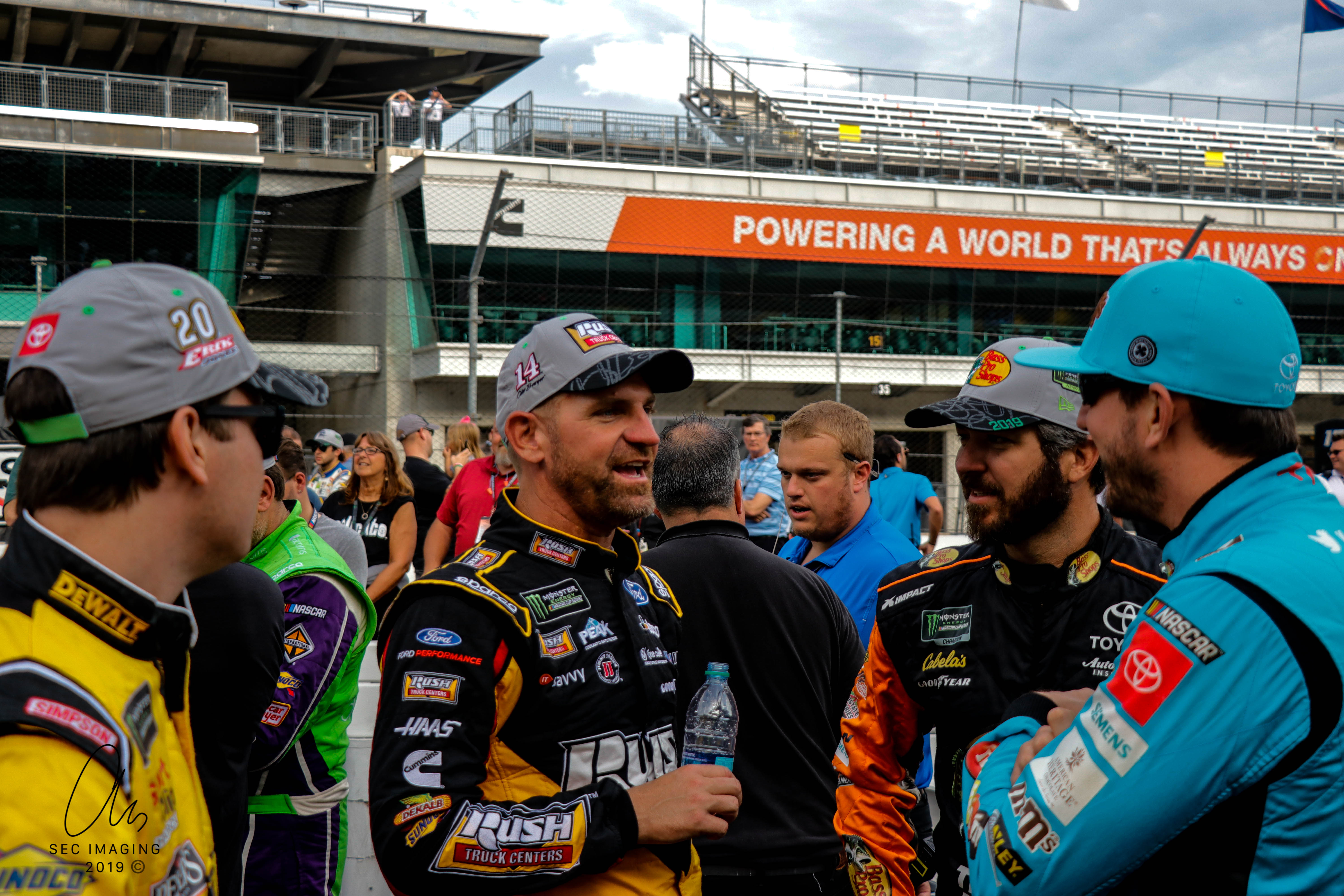 Quite possibly, Clint Bowyer's telling this group about his least favorite part of TPF's preview. (Photo Credit: Stephen Conley/TPF)