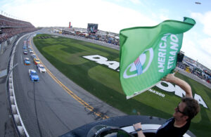 Dale Earnhardt Jr waved the green flag to start the 2020 Daytona 500 and NASCAR Cup Series season. (Photo Credit: Brian Lawdermilk/Getty Images)