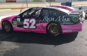 The infamous "black & pink" Rich Mar Florist paint scheme on Garrett Smithley's No. 52 at Martinsville Speedway, 2019. (Image provided by Jonathan Morrissey.)