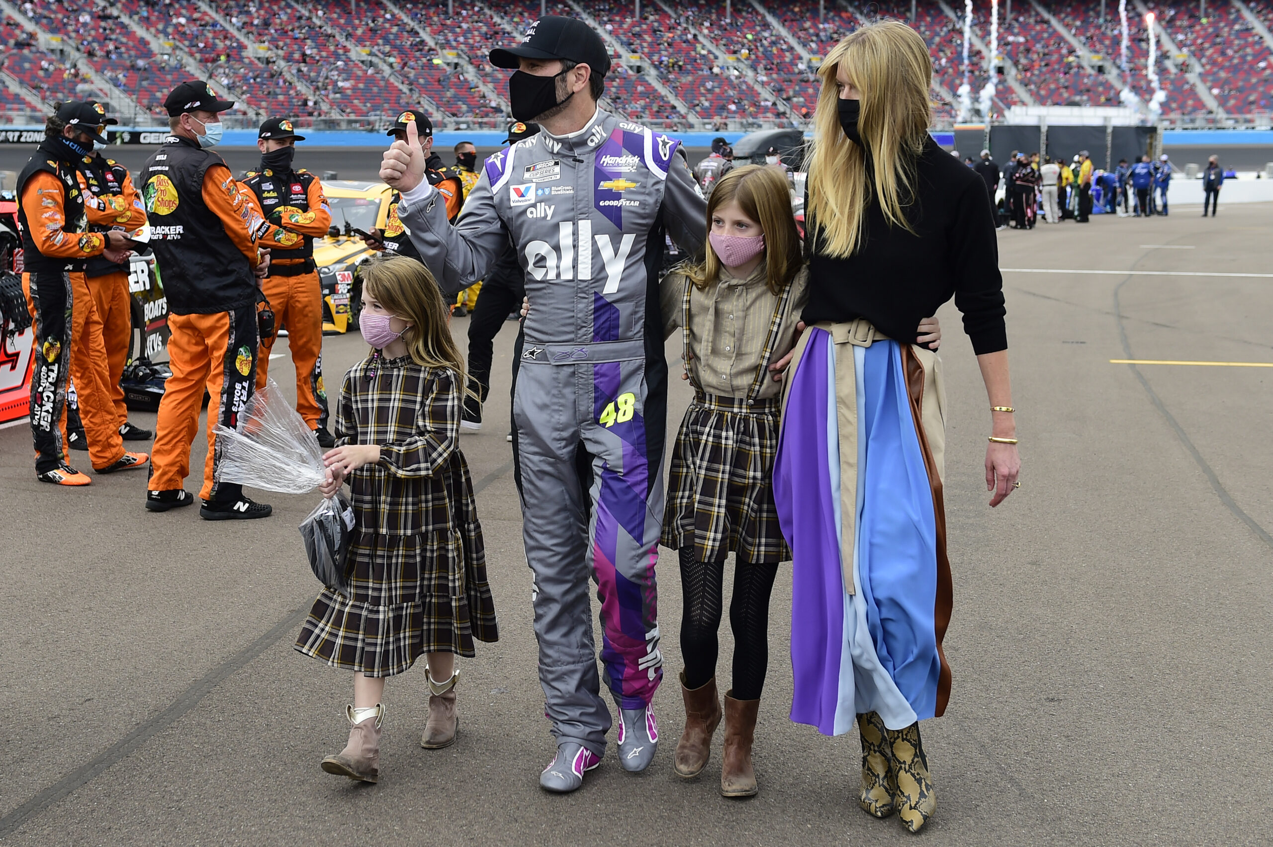 Suffice to say, Jimmie Johnson and his wife Chani look forward to more time with daughters Lydia and Genevieve. (Photo Credit: Jared C. Tilton/Getty Images)