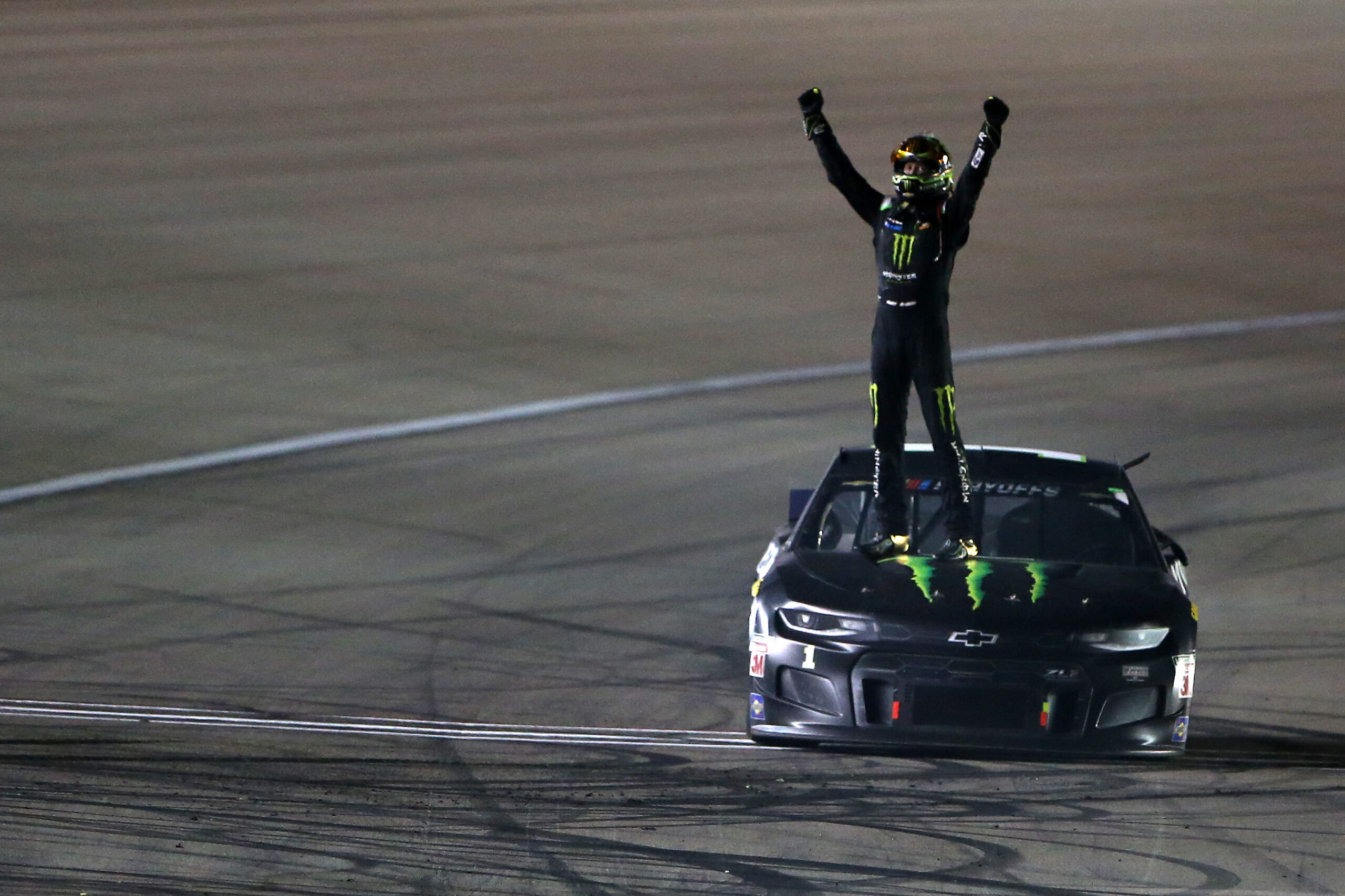 Arms raised in Victory at Las Vegas. (Photo Credit: Brian Lawdermilk/Getty Images)