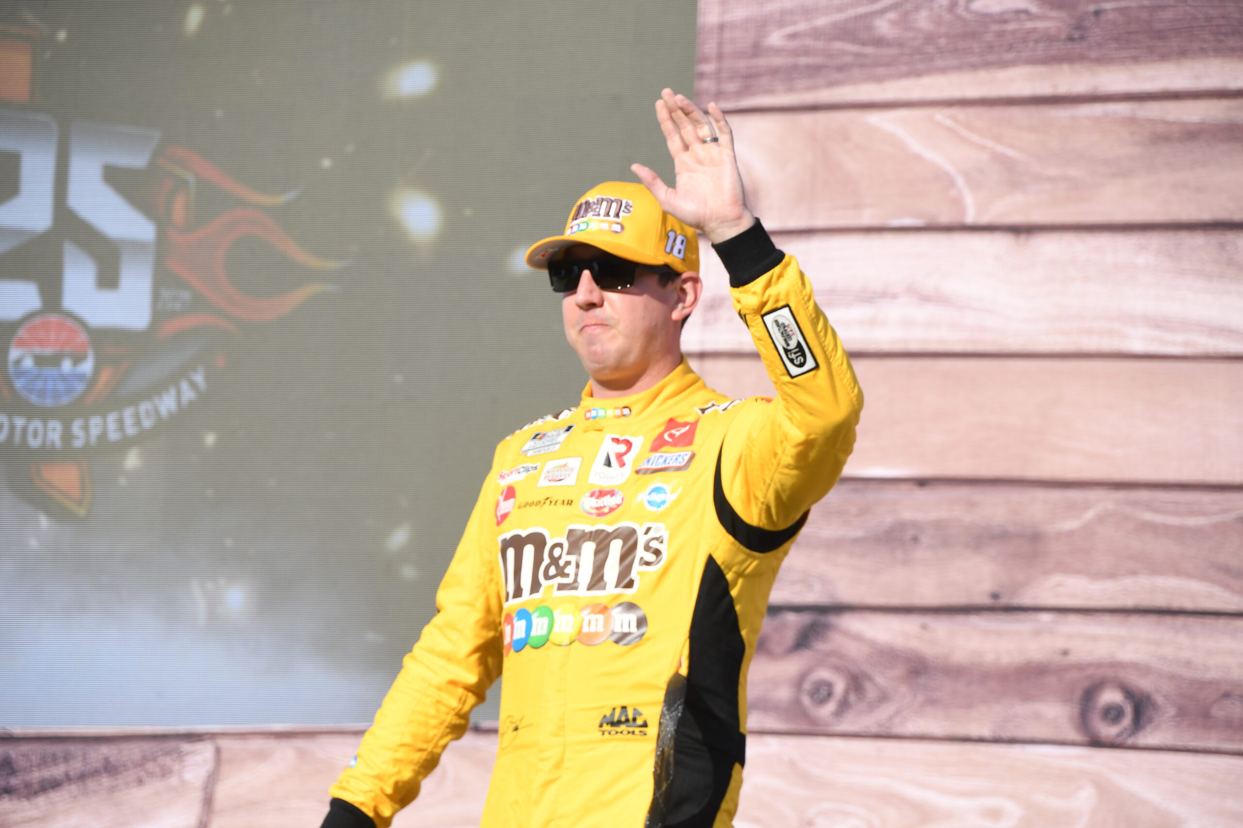 By all means, Kyle Busch waves hello to those supporting his candidacy as Kyle Larson's challenger. (Photo: Sean Folsom/The Podium Finish)