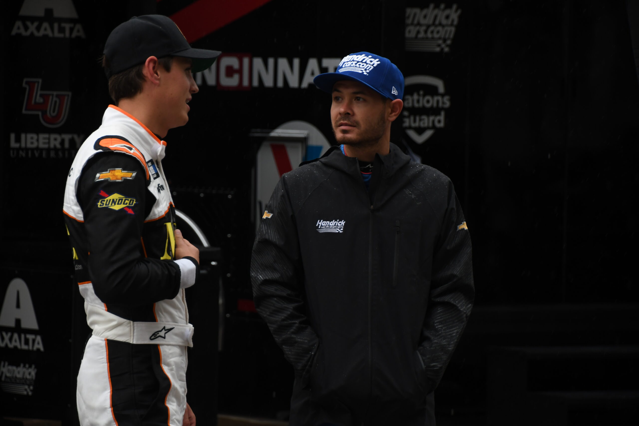Imagine being a fly near the hauler with this engrossing conversation between Zane Smith and Kyle Larson. (Photo: Sean Folsom | The Podium Finish)
