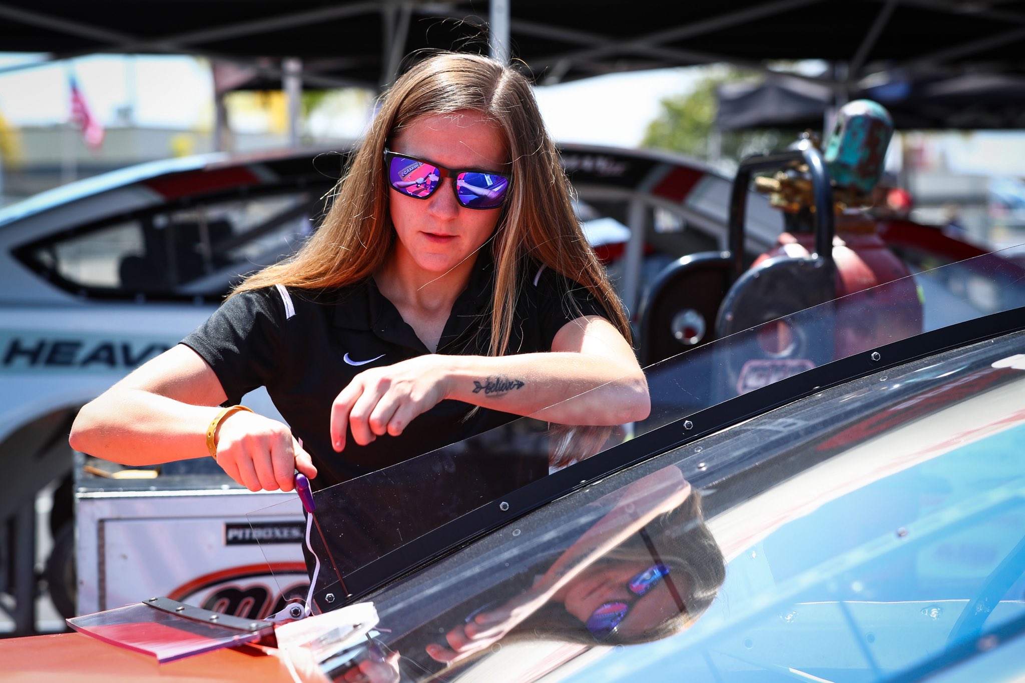 Slagle gets to work on her racecar with her sights set toward a bright future. (Photo: Amber Slagle via Twitter)
