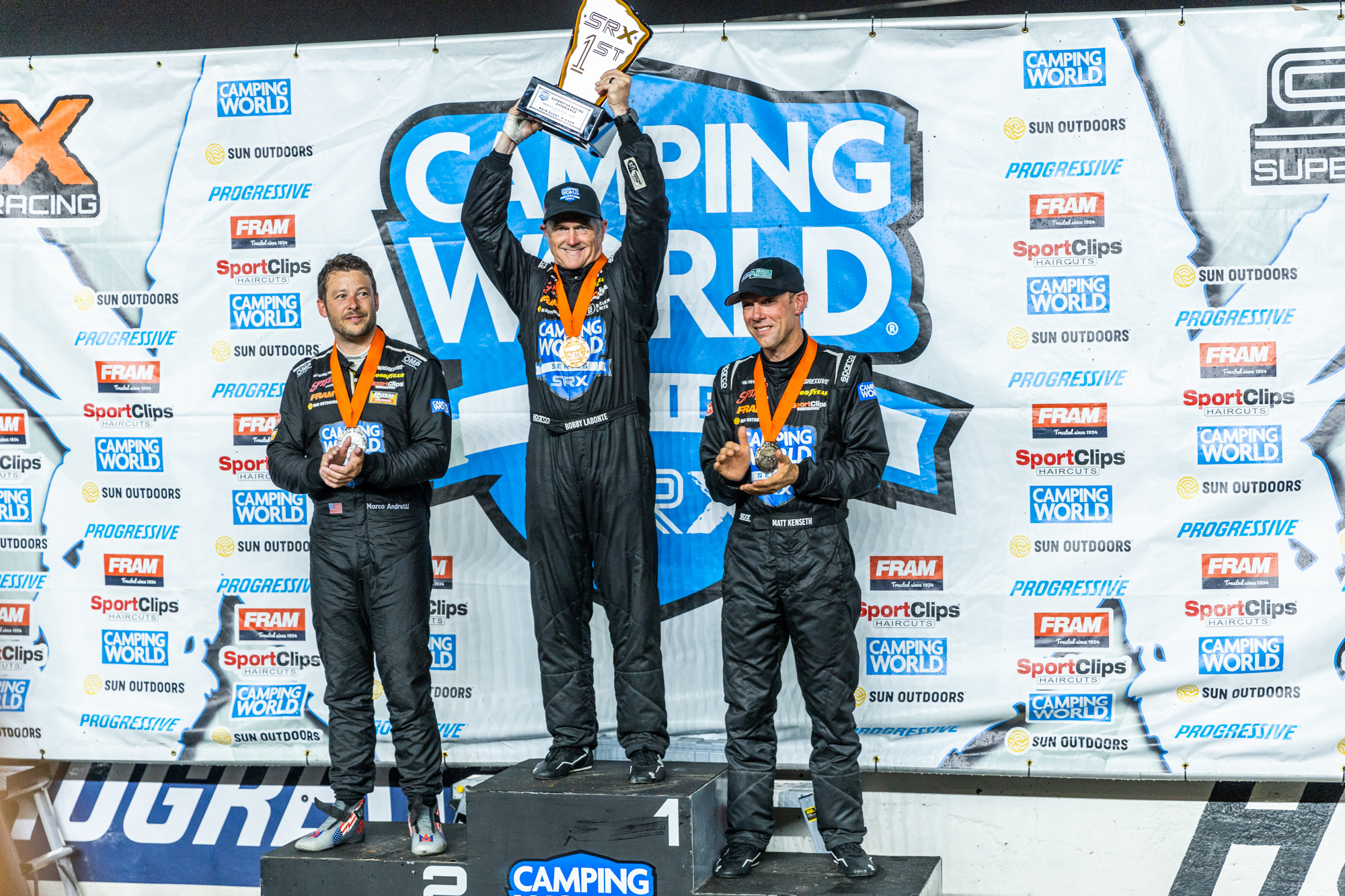 Labonte was on top of the podium with Andretti and Kenseth flanking him. (Photo: Eric Parks | The Podium Finish)