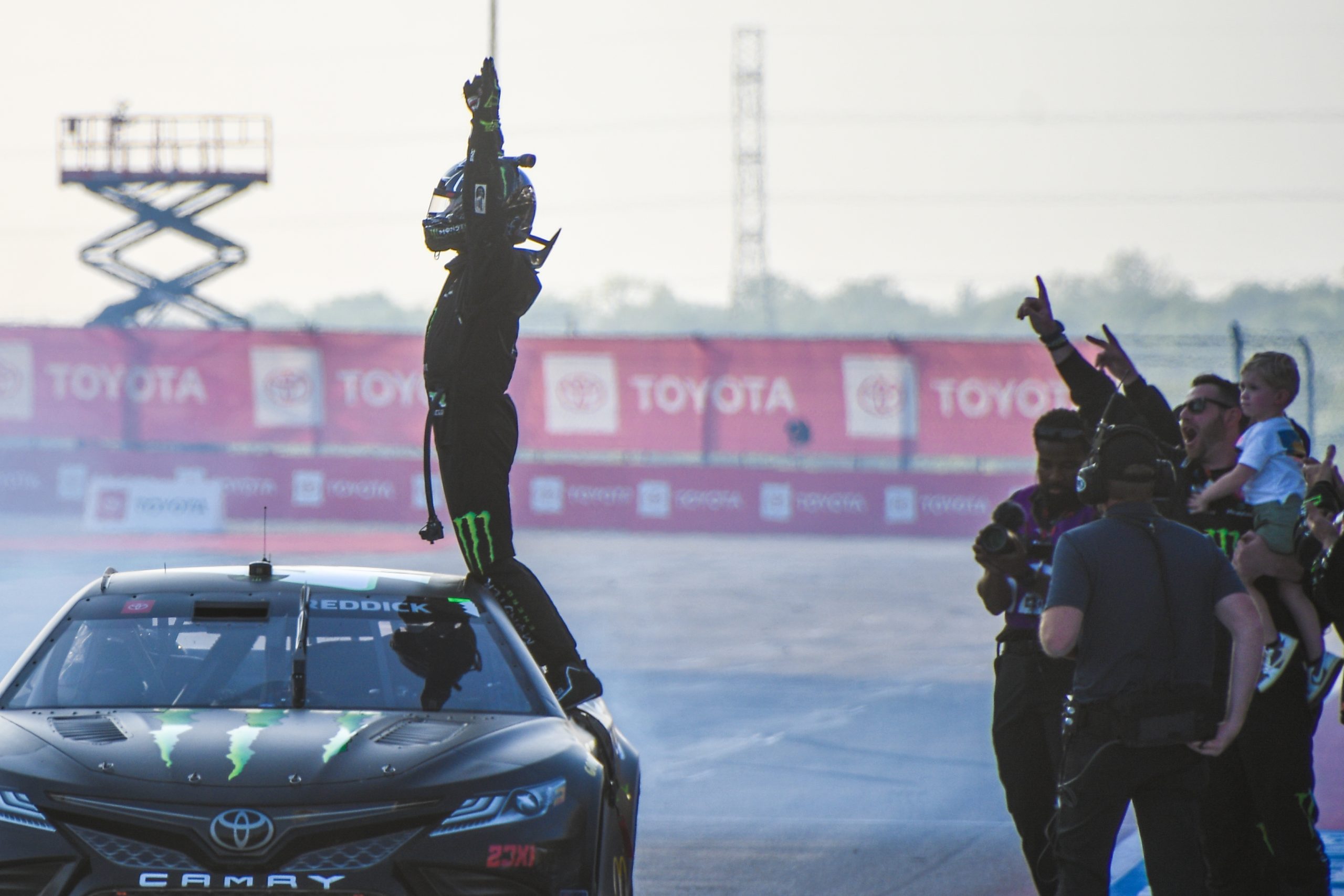 Arms raised in victory. (Photo: Sean Folsom | The Podium Finish)