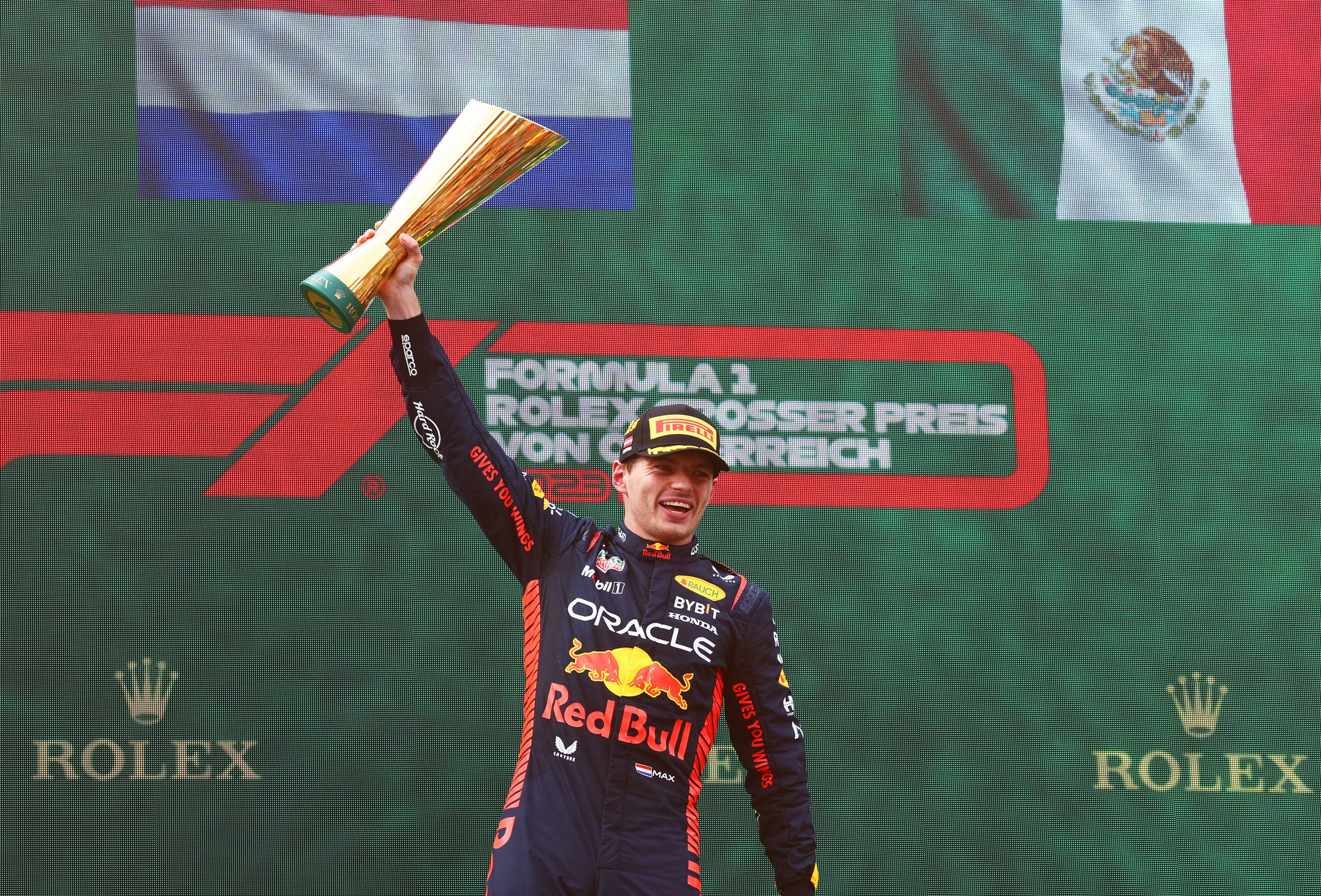 Red Bull Racing Driver Max Verstappen (1) lifts trophy on the podium at the Red Bull Ring after winning the Austrian Grand Prix
