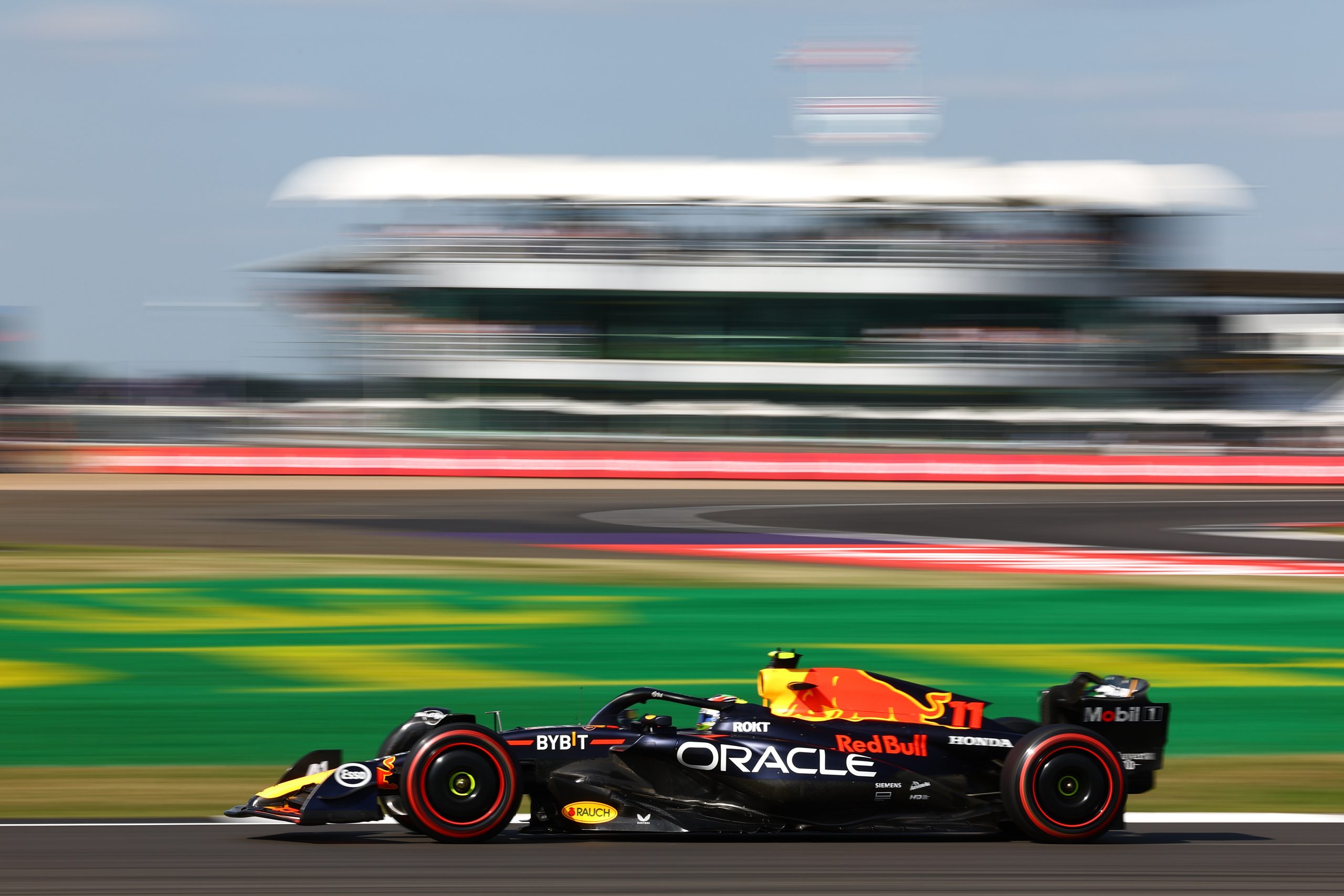 Sergio Perez (11) on track for Red Bull during the Friday practice sessions at the Silverstone Circuit