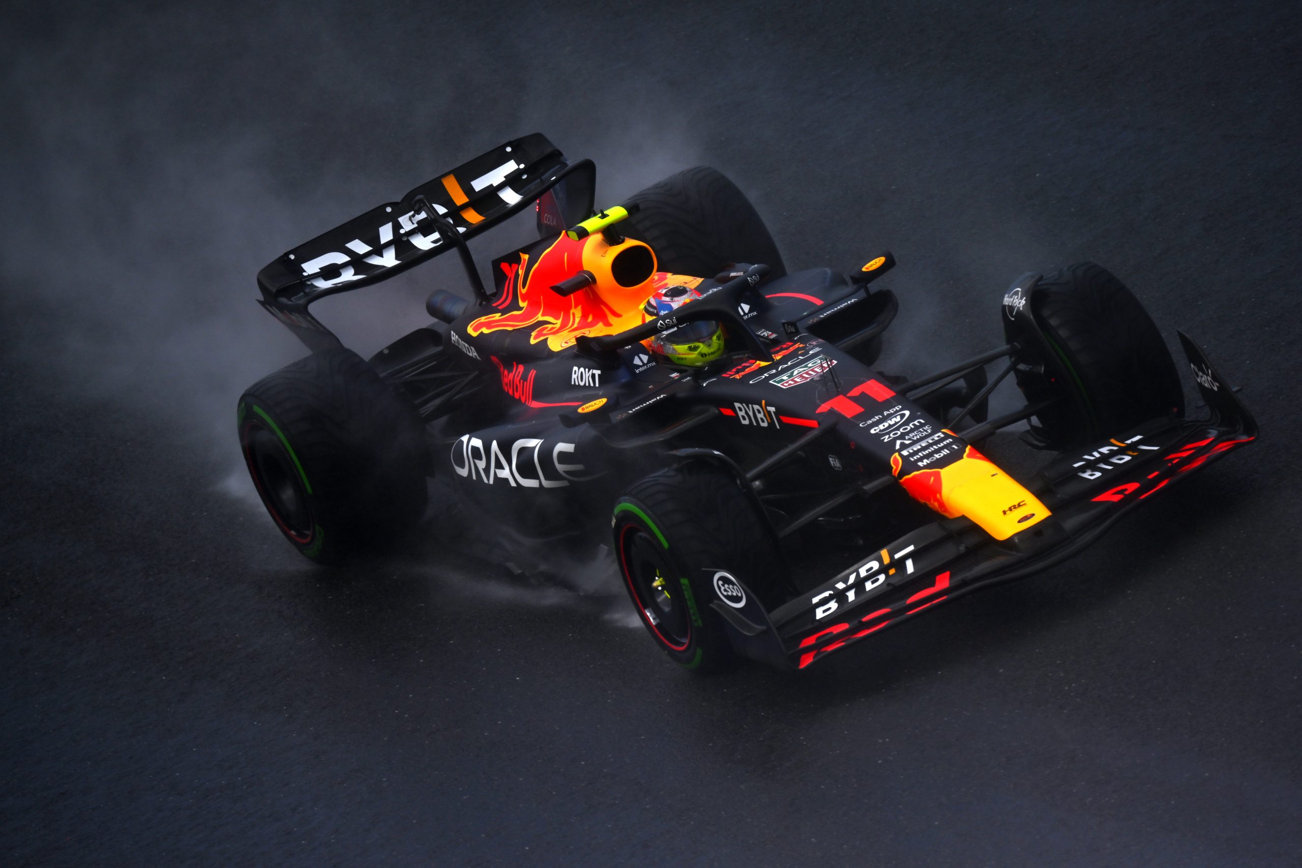 Sergio Perez (11) runs laps in the wet in his Red Bull during the Sprint Shoot Out during the Belgium Grand Prix weekend