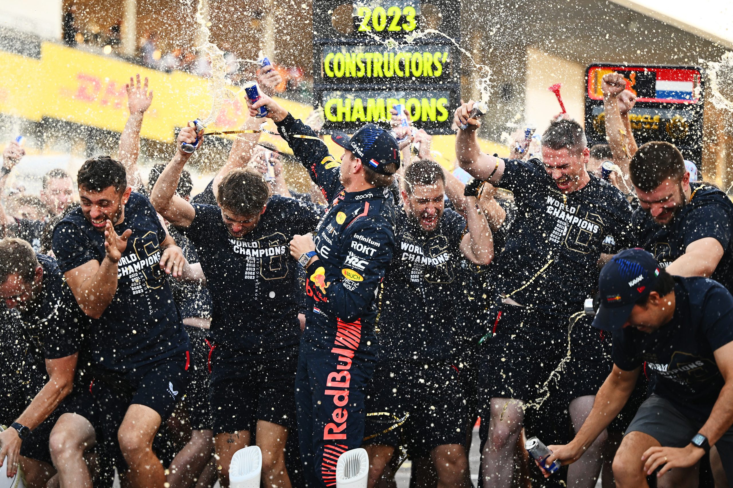 Race winner Max Verstappen of the Netherlands and Oracle Red Bull Racing celebrates Red Bull Racing's 2023 Constructors' Championship victory with his team after the F1 Grand Prix of Japan at Suzuka International Racing Course