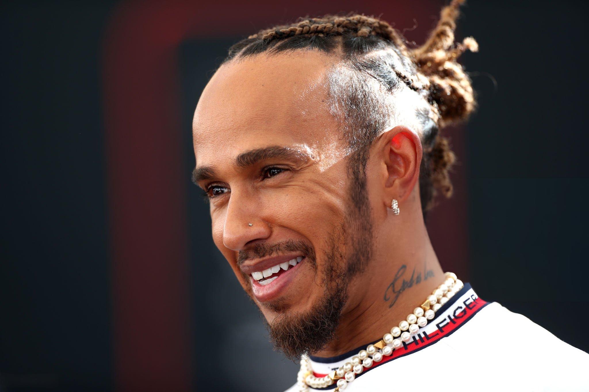 ABU DHABI, UNITED ARAB EMIRATES - NOVEMBER 23: Lewis Hamilton of Great Britain and Mercedes talks to the media in the Paddock during previews ahead of the F1 Grand Prix of Abu Dhabi at Yas Marina Circuit on November 23, 2023 in Abu Dhabi, United Arab Emirates. (Photo by Peter Fox | Getty Images)