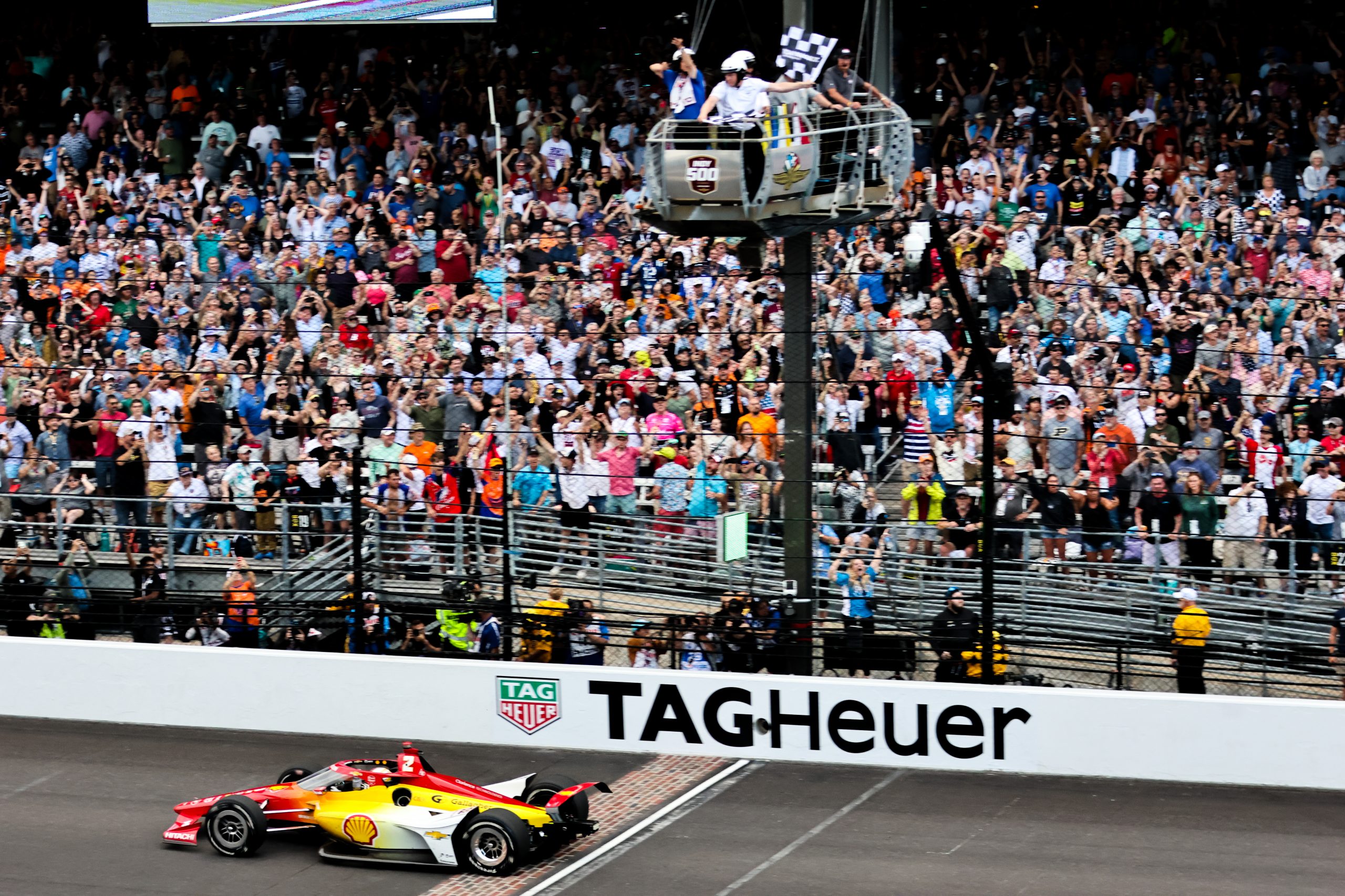 Josef Newgarden takes the checkered flag in the 108th running of the Indianapolis 500 (Photo: Wayne Riegle | The Podium Finish)