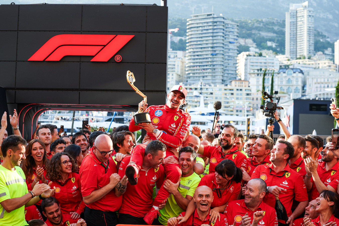 Charles Leclerc (16) lifted up by his Scuderia Ferrari team after winning the 2024 Formula 1 Monaco Grand Prix (Source: Scuderia Ferrari)