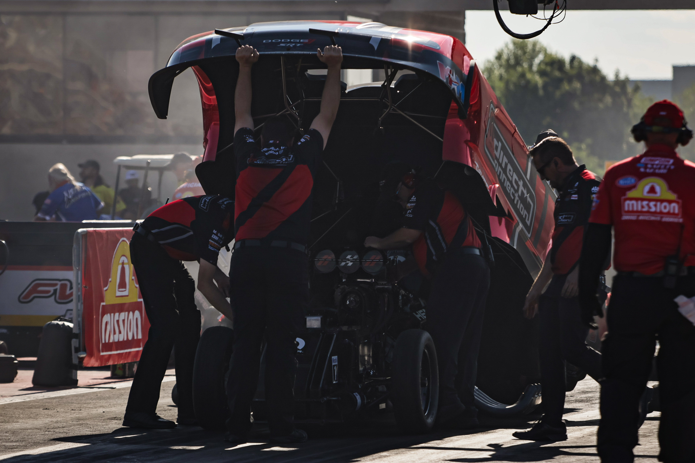 Matt Hagan's team readies him for competition during last weekend's Route 66 Nationals