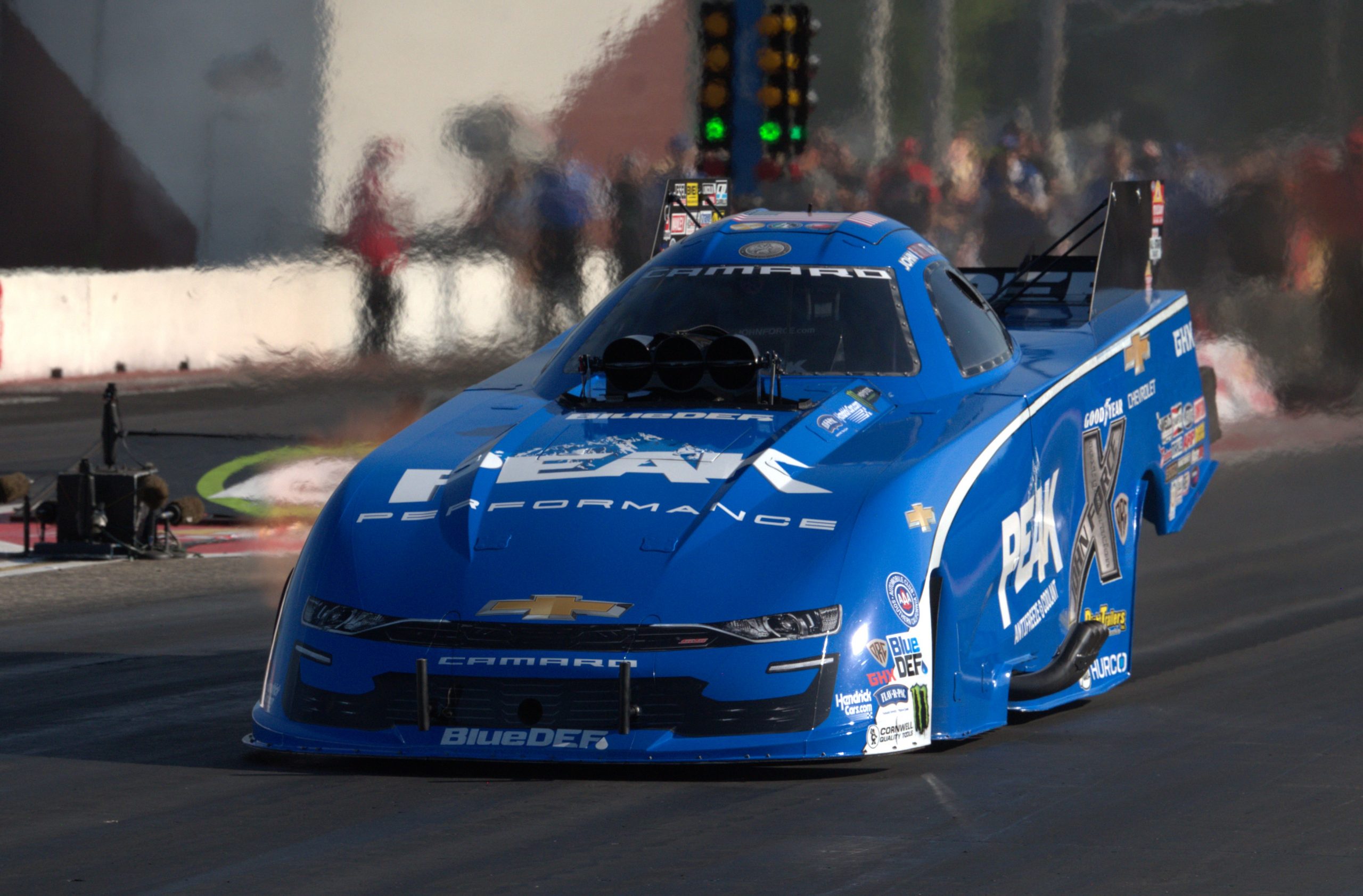 John Force took his PEAK Antifreeze Chevrolet to New England and came out a winner.