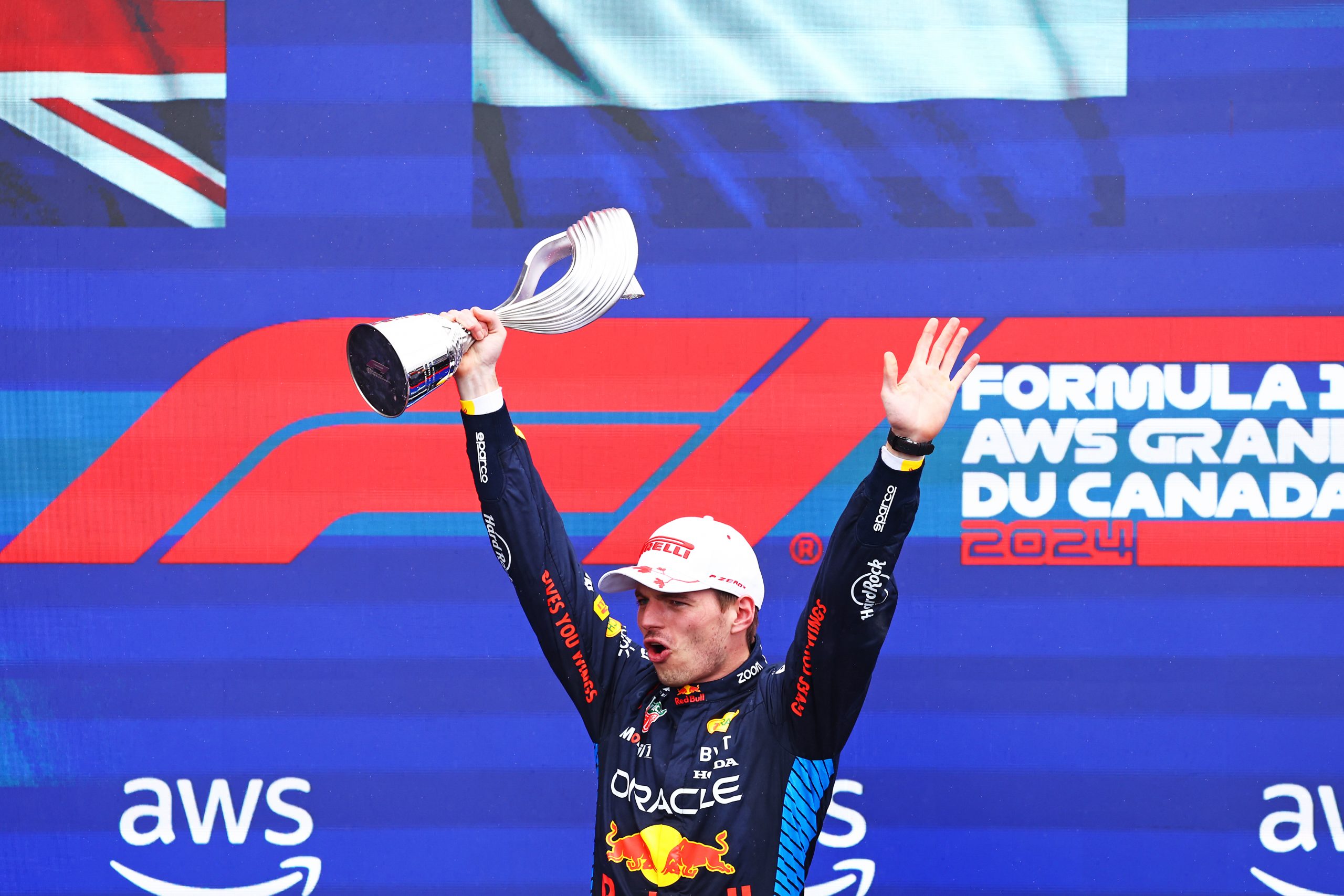 Race winner Max Verstappen of the Netherlands and Oracle Red Bull Racing celebrates with his trophy on the podium after the F1 Grand Prix of Canada at Circuit Gilles Villeneuve on June 09, 2024 in Montreal, Quebec. (Photo by Mark Thompson/Getty Images)