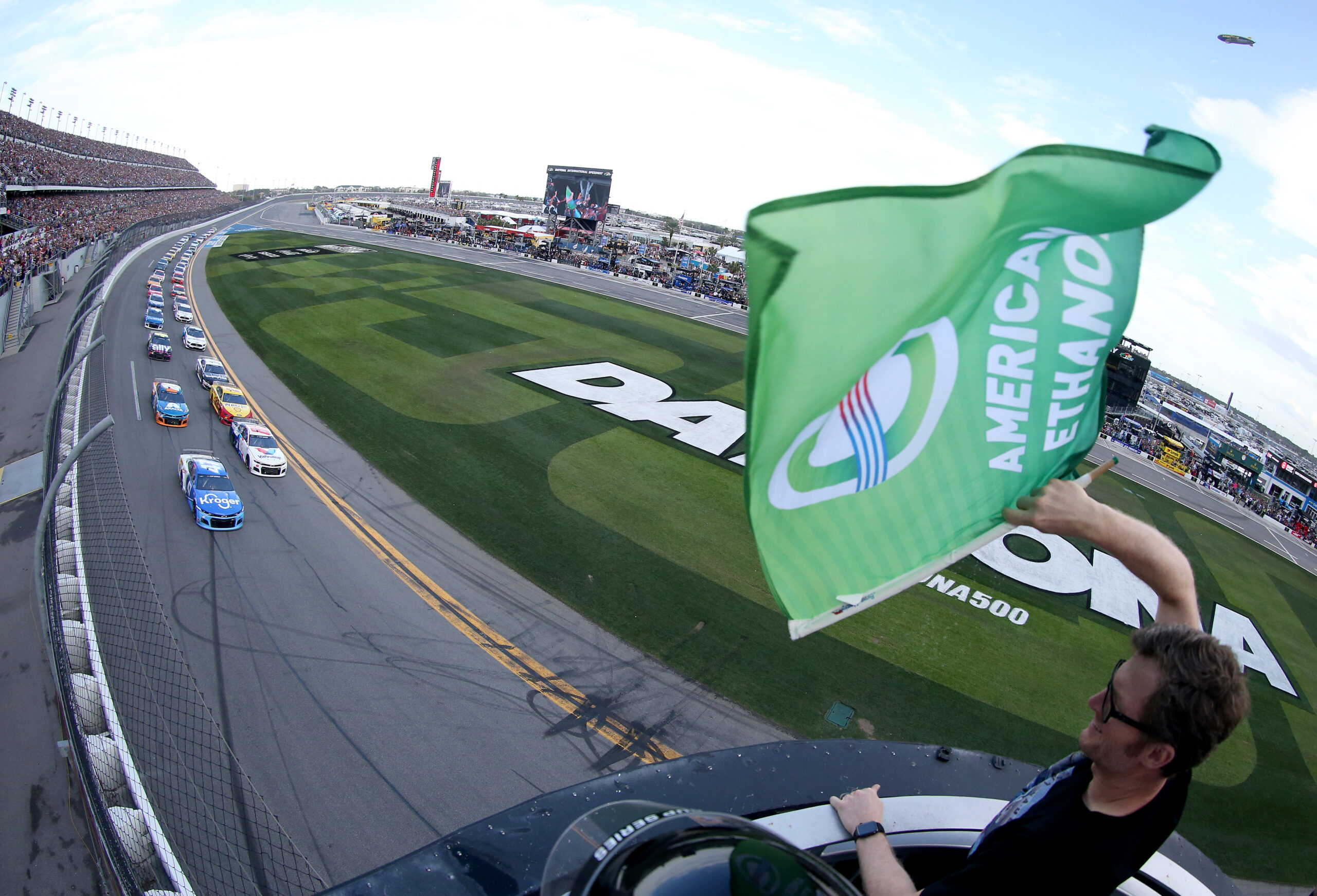 Dale Earnhardt Jr waved the green flag to start the 2020 Daytona 500 and NASCAR Cup Series season. (Photo Credit: Brian Lawdermilk/Getty Images)