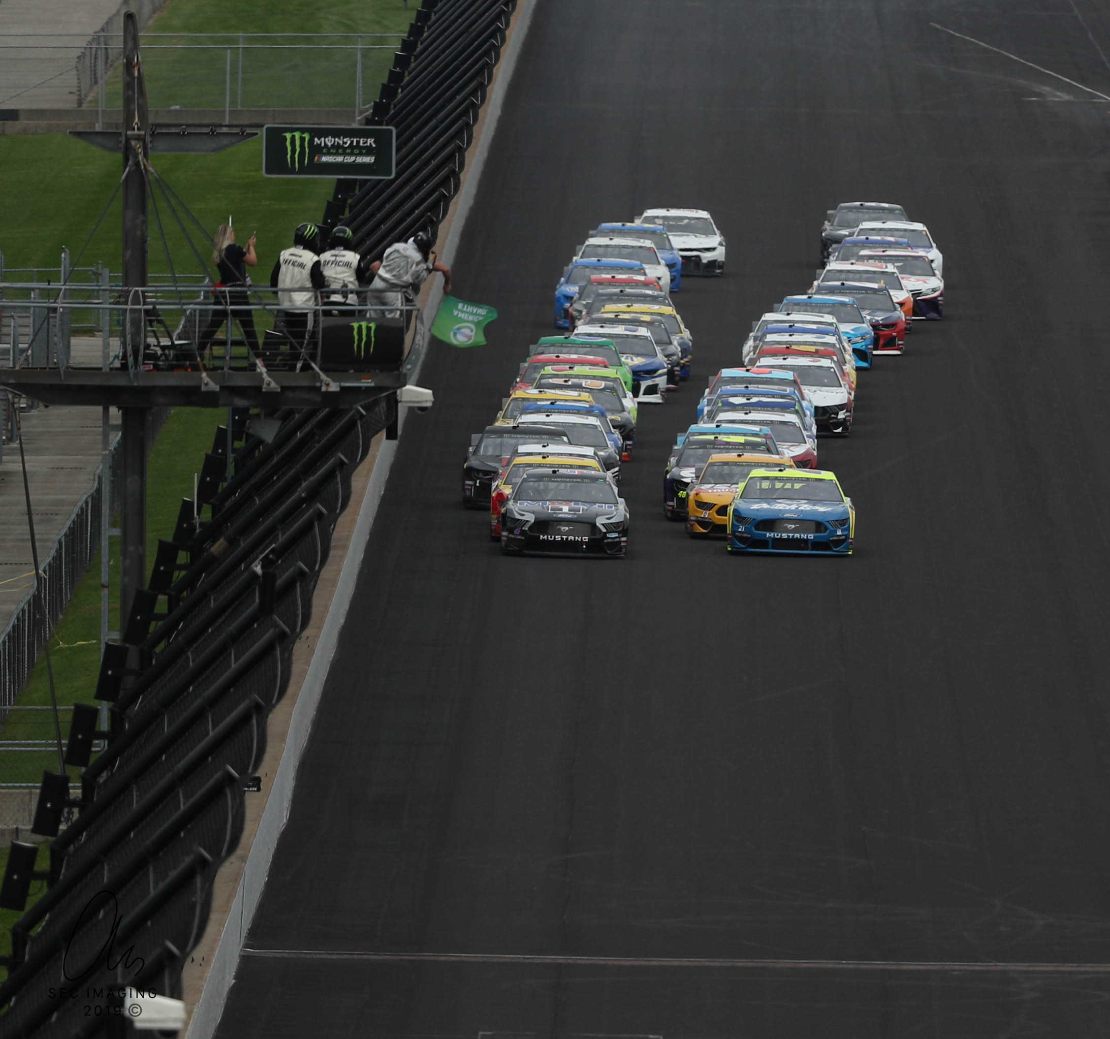 By all means, it's lights out and away we go in today's Brickyard 400! (Photo Credit: Stephen Conley/TPF)
