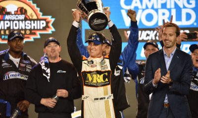 Zane Smith finally hoists the coveted NASCAR Truck championship trophy. (Photo: Luis Torres | The Podium Finish)