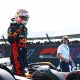 Max Verstappen (1) exits his Red Bull after taking the pole for the British Grand Prix ahead of Lando Norris (4) and Oscar Piastri (81)