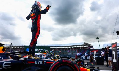 Max Verstappen (1) celebrates on top of his Red Bull after winning the Silverstone Grand Prix