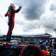 Max Verstappen (1) celebrates on top of his Red Bull after winning the Silverstone Grand Prix