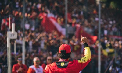 Carlos Sainz (55) salutes the Ferrari fans following his pole position at the Monza Circuit for the Formula 1 Italian Grand Prix