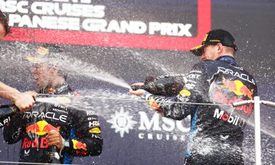 Race winner Max Verstappen of the Netherlands and Oracle Red Bull Racing and Second placed Sergio Perez of Mexico and Oracle Red Bull Racing celebrate on the podium during the F1 Grand Prix of Japan at Suzuka International Racing Course on April 07, 2024 in Suzuka, Japan. (Photo by Peter Fox/Getty Images)