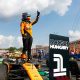 Oscar Piastri celebrates on top of his McLaren Formula 1 MCL38 after capturing his first Formula 1 Grand Prix Victory at the Hungaroring in the Hungarian Grand Prix (Source: McLarenF1 on X)