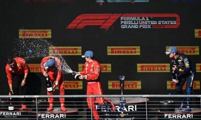 Race winner Charles Leclerc of Monaco and Ferrari, Second placed Carlos Sainz of Spain and Ferrari and Max Verstappen of the Netherlands and Oracle Red Bull Racing celebrate on the podium after the F1 Grand Prix of United States at Circuit of The Americas on October 20, 2024 in Austin, Texas. (Photo by Mark Sutton/Getty Images)