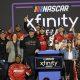 Justin Allgaier and the No. 7 Brandt JR Motorsports team celebrate their first NASCAR Xfinity Series championship at Phoenix Raceway on Saturday, November 9, 2024. (Photo: Ricky Martinez | The Podium Finish)