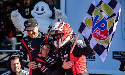 Porsche Penske teammates Felipe Nasr, Nick Tandy, and Laurens Vanthoor celebrate overall win in the Rolex 24 at Daytona
