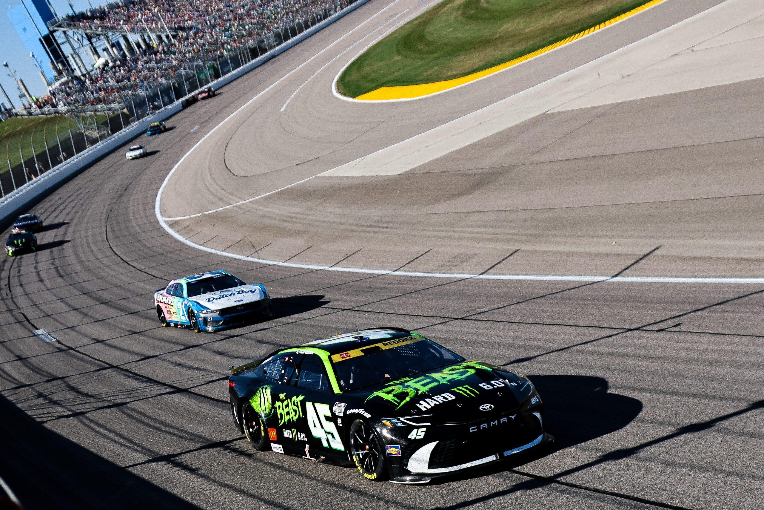 Tyler Reddick rides the middle lane in Turn 1 during the Hollywood Casino 400 at Kansas Speedway.