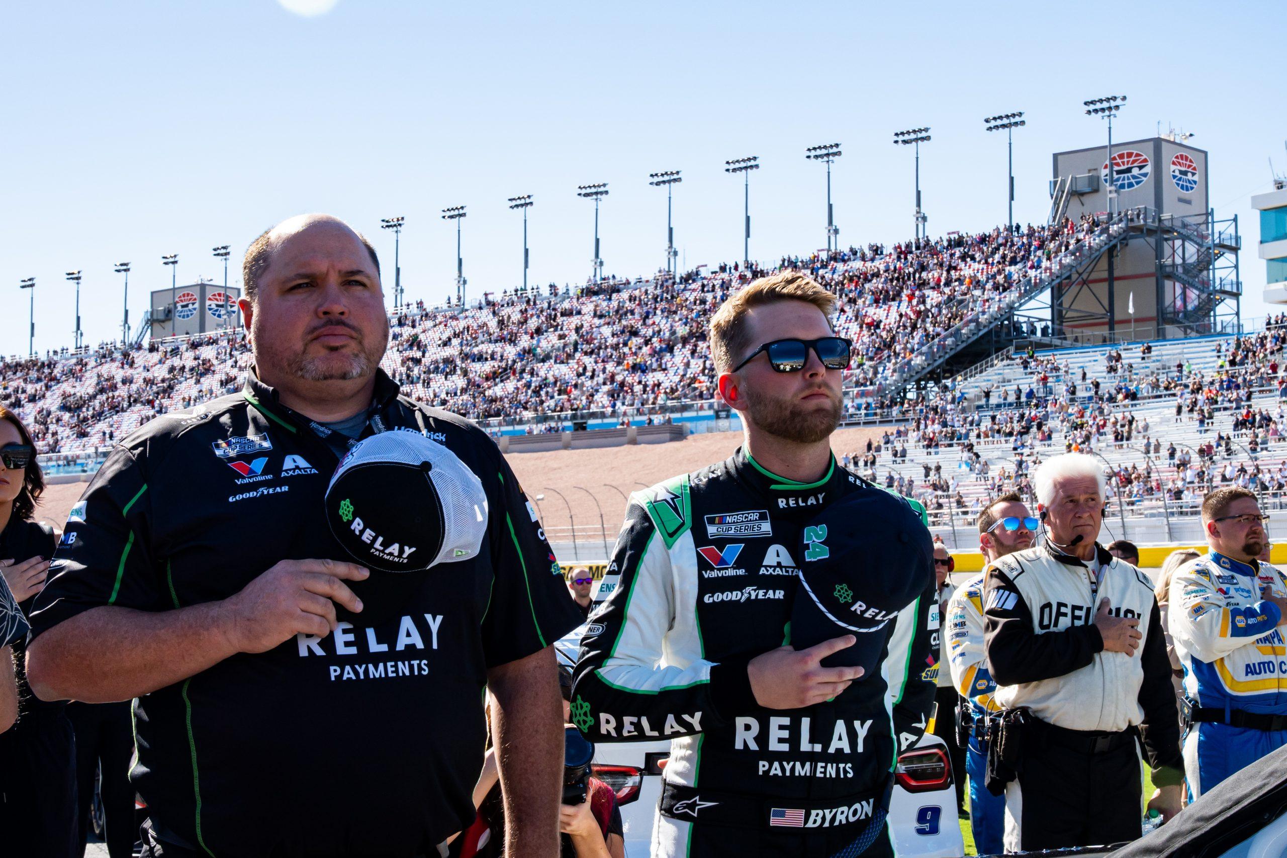 William Byron (right) and Rudy Fugle (left) standing on pit road during pre-race ceremonies for the South Point 400 from Las Vegas Motor Speedway.