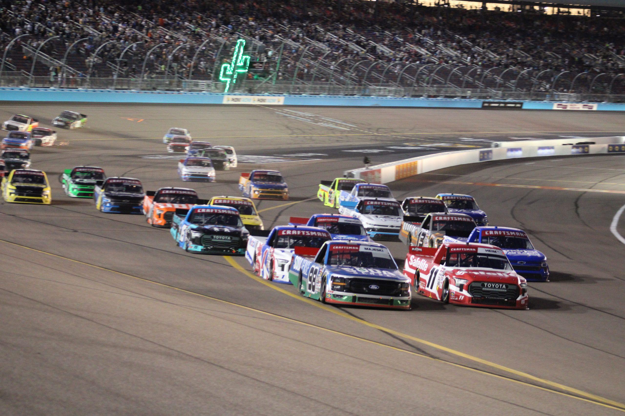 Ty Majeski leads the field on a restart during the NASCAR Craftsman Truck Series Championship Race from Phoenix Raceway.
