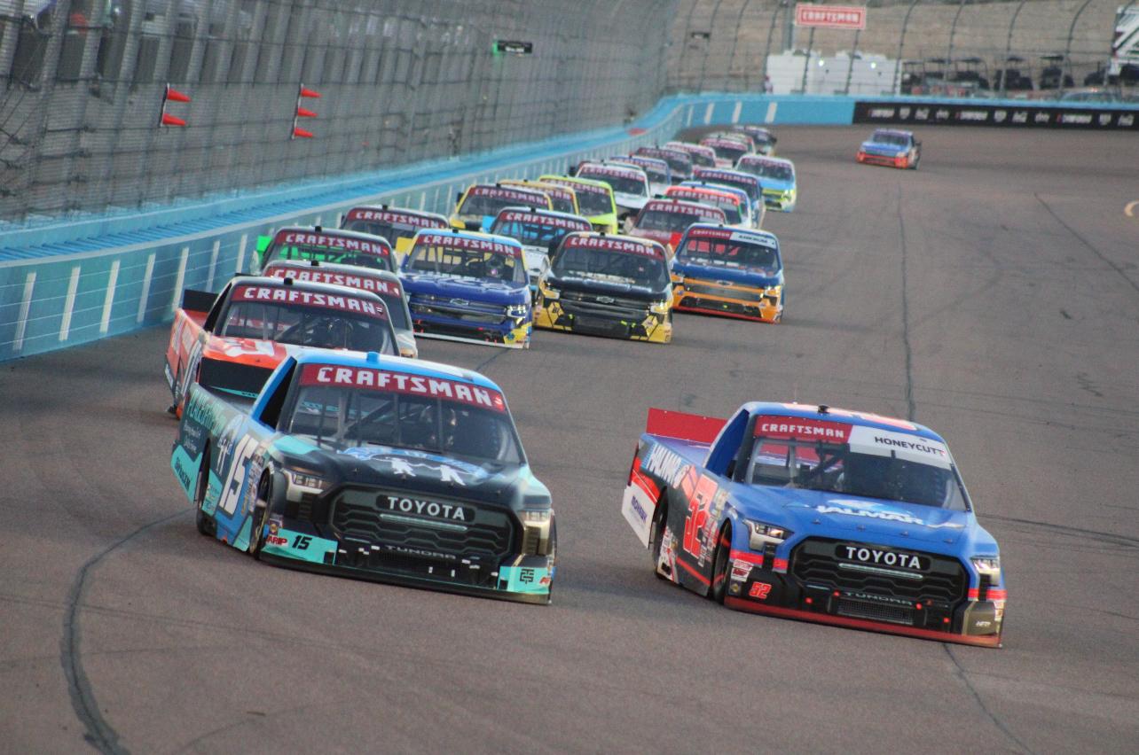 Kaden Honeycutt (right) in a thrilling battle with Tanner Gray (left) in the NASCAR Craftsman Truck Series Championship Race at Phoenix Raceway. (Photo: Michael Donahue | The Podium Finish)