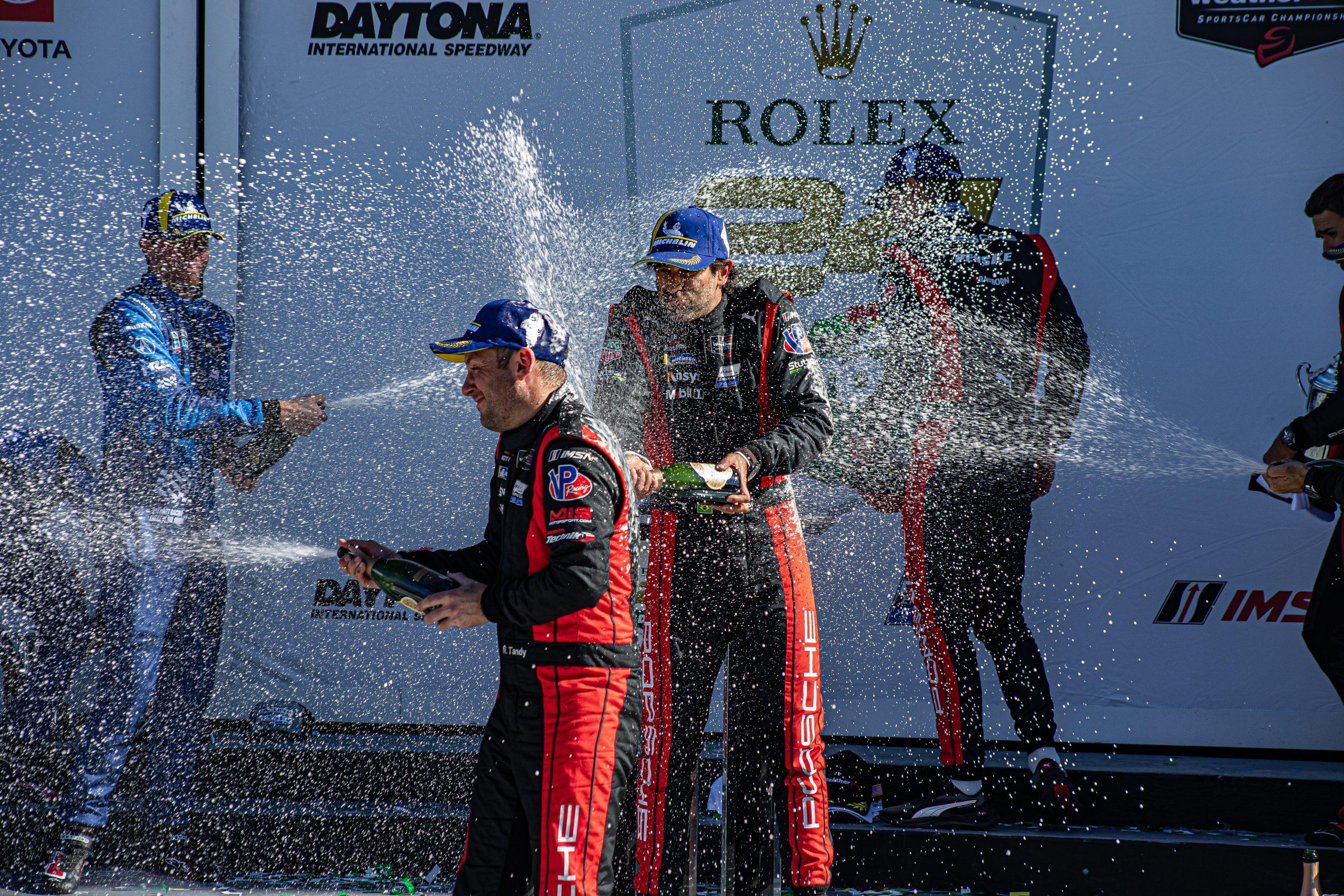 Nick Tandy celebrating his 2025 Rolex 24 win with teammate Felipe Nasr (Photo: Jared Bokanoski | The Podium Finish)