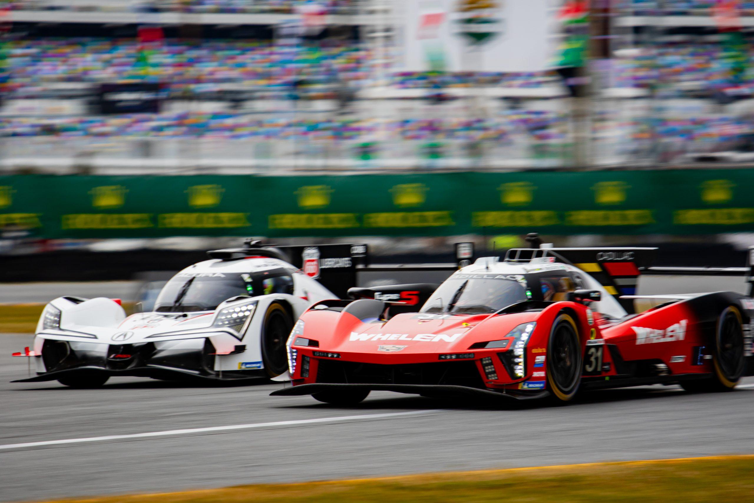The No. 31 Whelen Cadillac battles the No. 93 Acura out of the International Horseshoe at Daytona International Speedway (Photo: Tyson Gifford | The Podium Finish)
