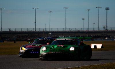 AO Racing's No. 77 "Rexy" Porsche battling with Winward Racing in the late stages of the Rolex 24 at Daytona (Photo: Tyson Gifford | The Podium Finish)