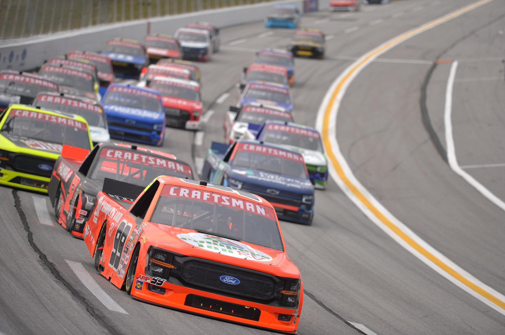 Ben Rhodes leads the field into Turn 3 at EchoPark Speedway during the Fr8 Racing 208.