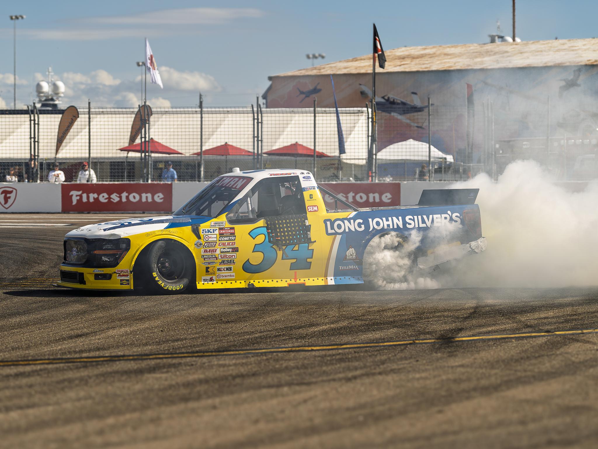 Layne Riggs performs a burnout after winning the OnlyBulls Green Flag 150 from the St. Petersburg Street Course.