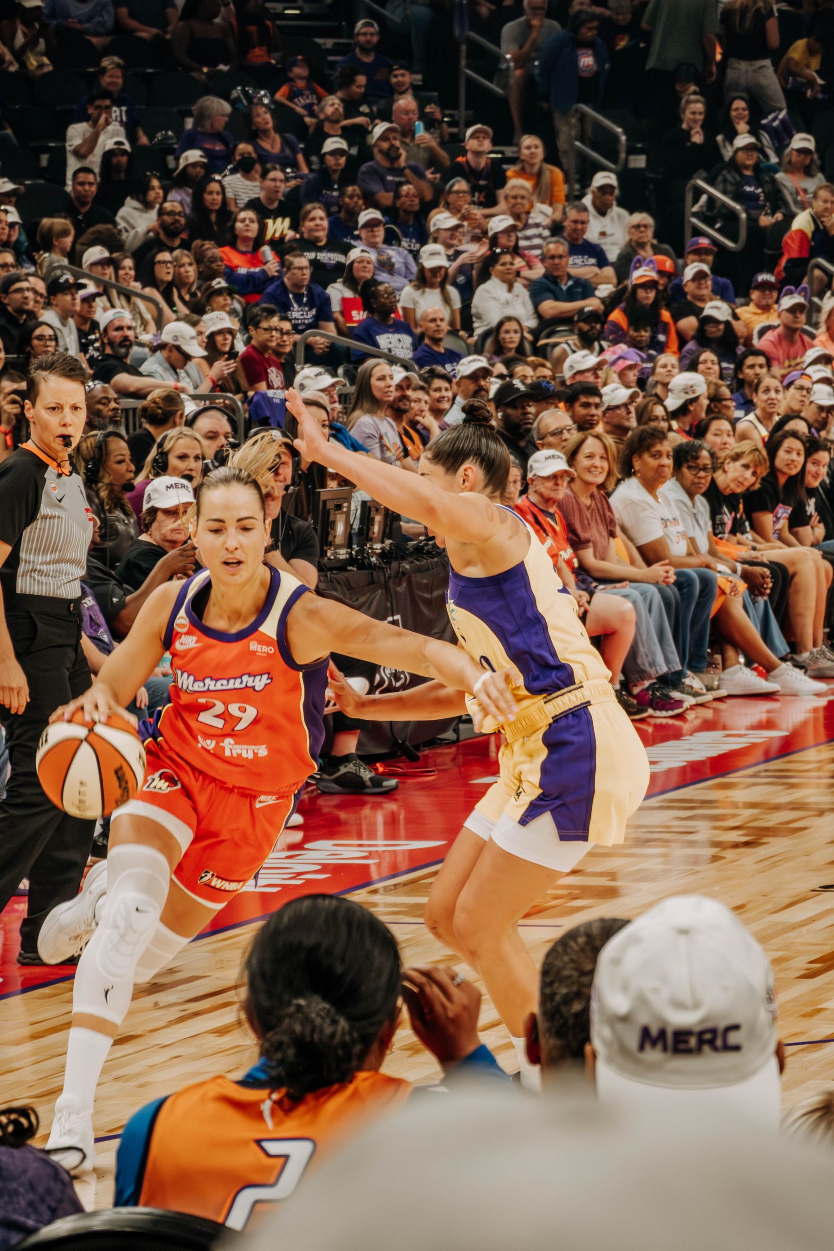 Phoenix Mercury guard Jovana Nogic (no. 29) guarding against Los Angeles Sparks guard Kelsey Plum during a game on May 21. (Photo- Trippy Traveler)