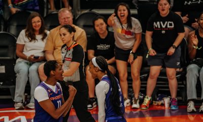 Phoenix Mercury forwards Valeriane Ayayi (No. 11) and DeWanna Bonner (No. 24) celebrate during a matchup against the Seattle Storm. (Photo- Adrianna Peralta, Trippy Traveler Media)