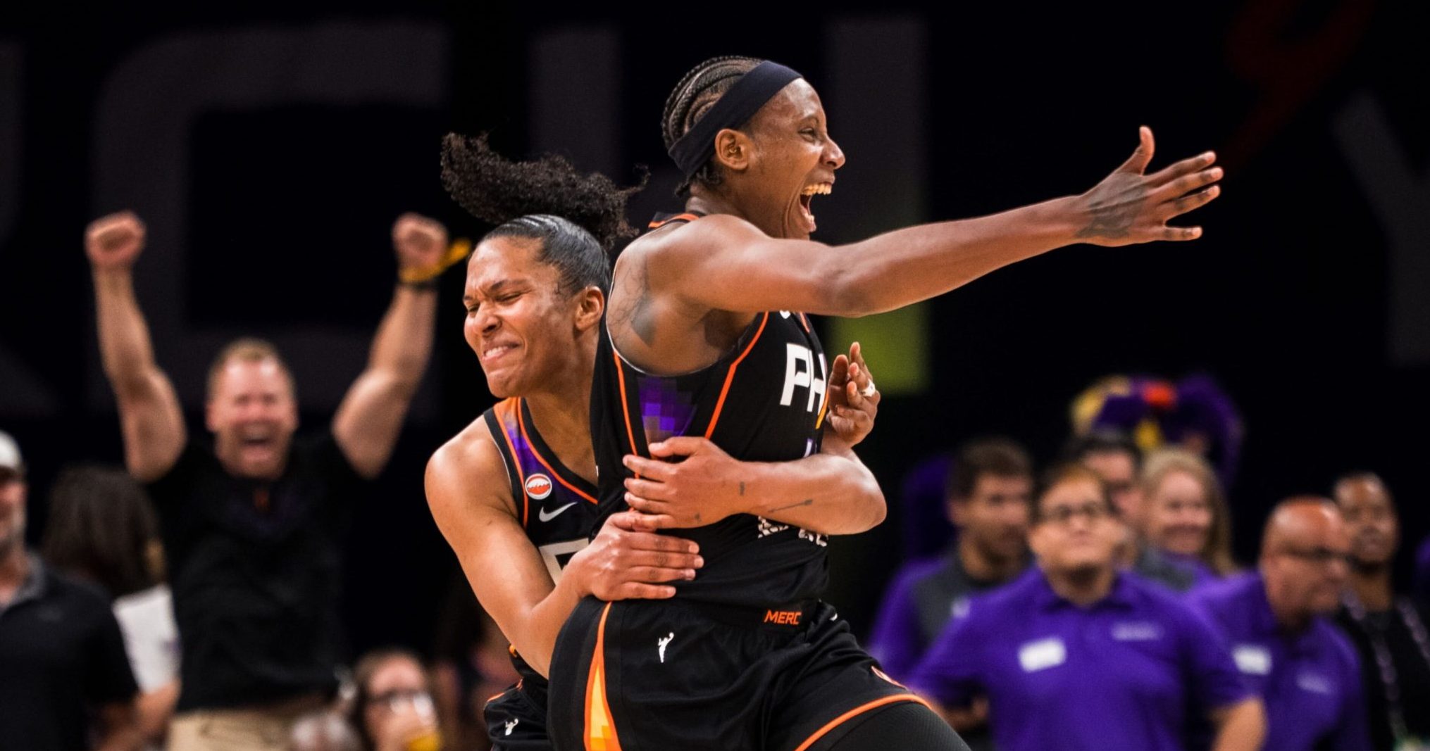 Phoenix Mercury teammates, center Natasha Mack (no. 4) and forward Alyssa Thomas, celebrate during a game against the Los Angeles Sparks on June 13. (Photo- Phoenix Mercury)